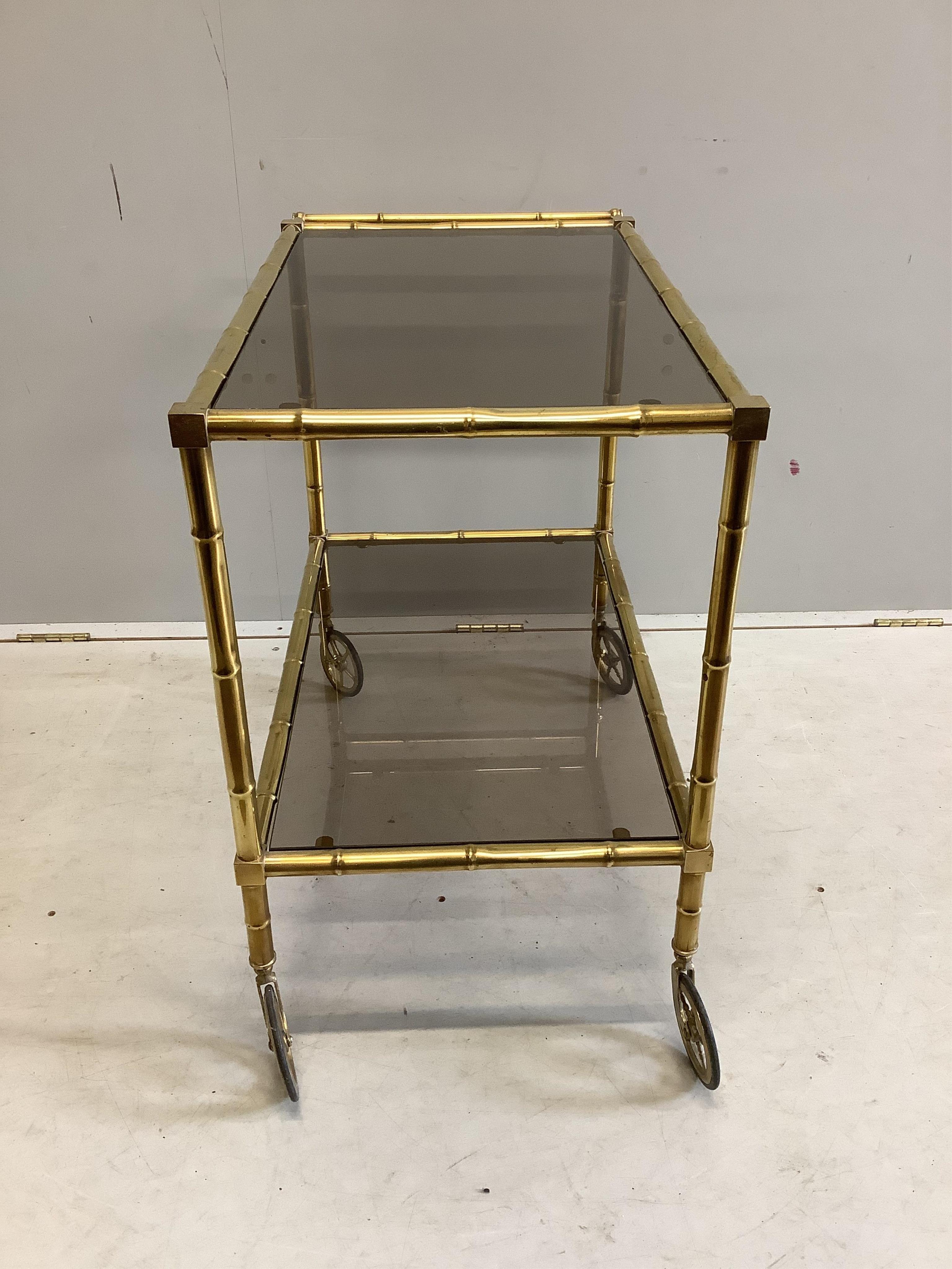 A Maison Jansen style faux bamboo brass two tier trolley, width 75cm, depth 42cm, height 65cm